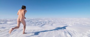 Naked man running across frozen lake