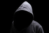 depositphotos_24539069-Hooded-man-in-the-shadow